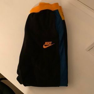 Black, Blue, and Orange Nike Women’s Sweatpants